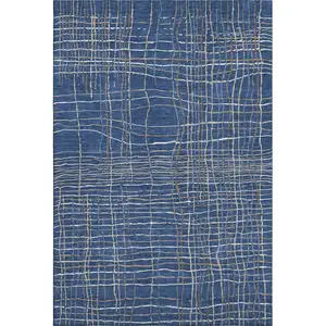 Photo of Navy Blue And Ivory Striped Washable Area Rug With UV Protection