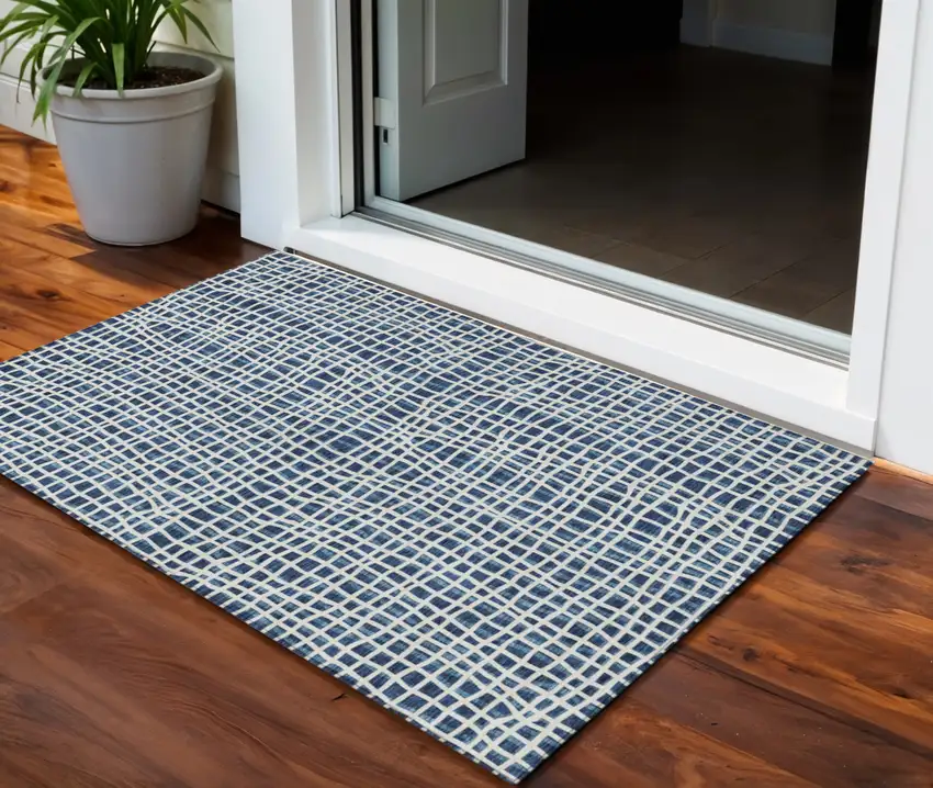 Navy Blue And Ivory Striped Washable Indoor Outdoor Area Rug Photo 1