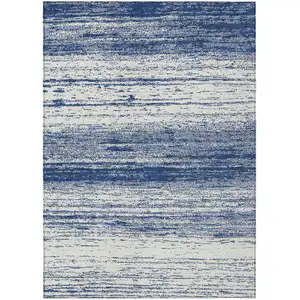 Photo of Navy Blue And Ivory Striped Washable Indoor Outdoor Area Rug