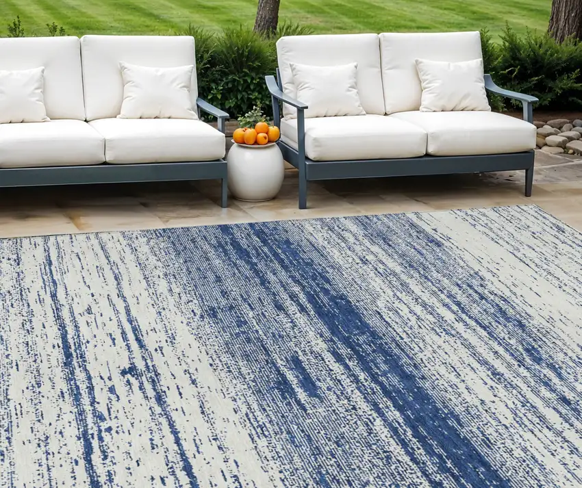 Navy Blue And Ivory Striped Washable Indoor Outdoor Area Rug Photo 1