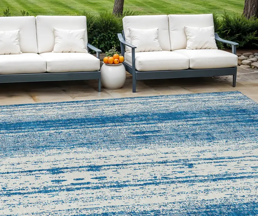 Navy Blue And Ivory Striped Washable Indoor Outdoor Area Rug Photo 1