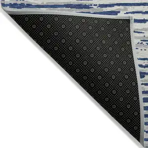 Photo of Navy Blue And Ivory Striped Washable Indoor Outdoor Area Rug