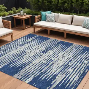Photo of Navy Blue And Ivory Striped Washable Indoor Outdoor Area Rug