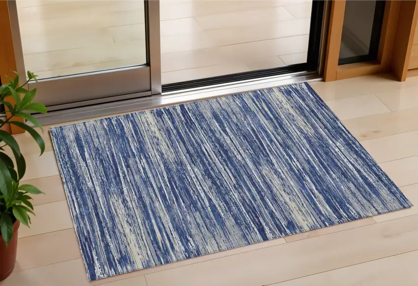 Navy Blue And Ivory Striped Washable Indoor Outdoor Area Rug Photo 1