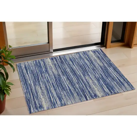 Navy Blue And Ivory Striped Washable Indoor Outdoor Area Rug Photo 1