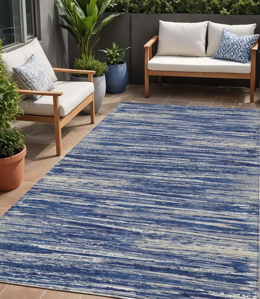 Navy Blue And Ivory Striped Washable Indoor Outdoor Area Rug Photo 1
