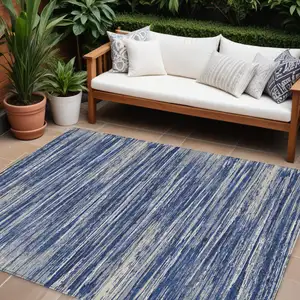 Photo of Navy Blue And Ivory Striped Washable Indoor Outdoor Area Rug
