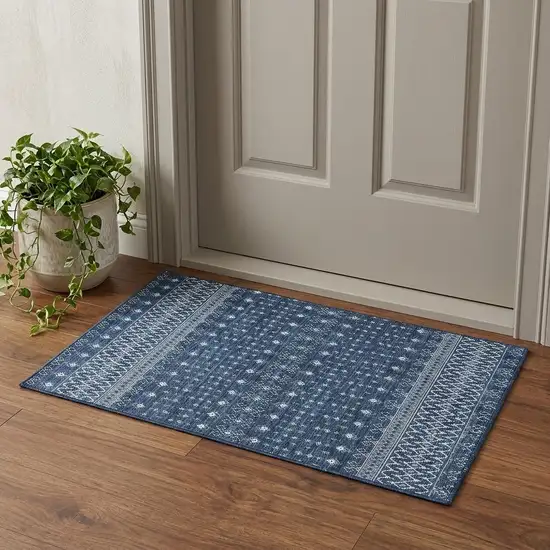 Navy Blue And Ivory Tribal Washable Area Rug With UV Protection Photo 1