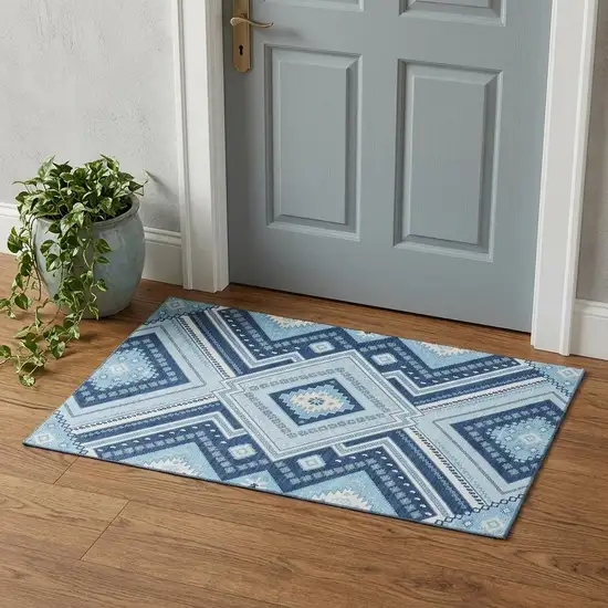 Navy Blue And Ivory Tribal Washable Area Rug With UV Protection Photo 1