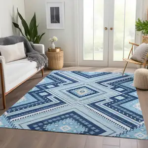 Photo of Navy Blue And Ivory Tribal Washable Area Rug With UV Protection