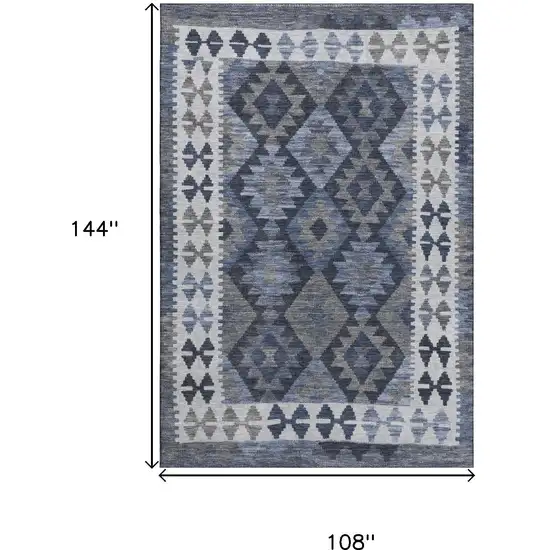 Navy Blue And Ivory Tribal Washable Area Rug With UV Protection Photo 9
