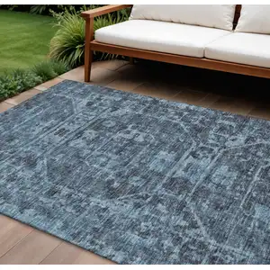 Photo of Navy Blue And Ivory Tribal Washable Indoor Outdoor Area Rug