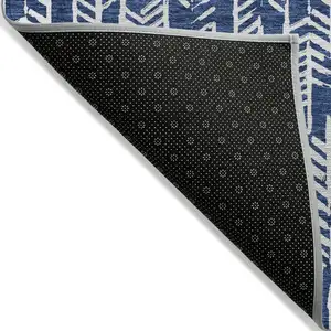 Photo of Navy Blue And Ivory Tribal Washable Indoor Outdoor Area Rug