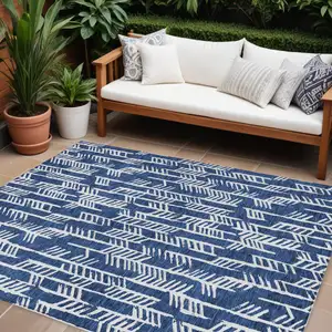 Photo of Navy Blue And Ivory Tribal Washable Indoor Outdoor Area Rug