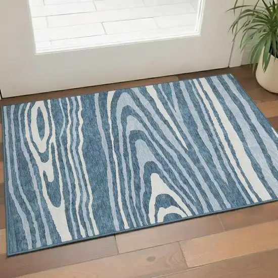 Navy Blue And Ivory Woodland Lodge Washable Area Rug With UV Protection Photo 2