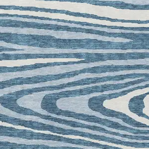 Photo of Navy Blue And Ivory Woodland Lodge Washable Area Rug With UV Protection