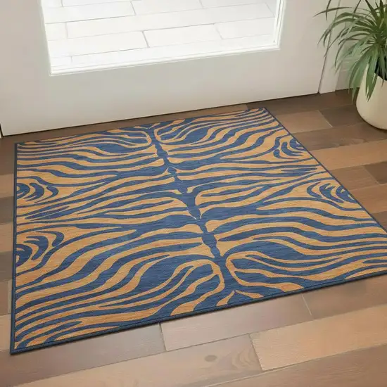 Navy Blue And Orange Animal Print Washable Area Rug With UV Protection Photo 2