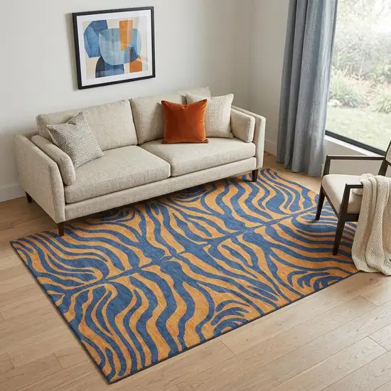 Navy Blue And Orange Animal Print Washable Area Rug With UV Protection Photo 1