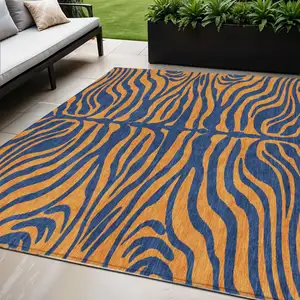 Photo of Navy Blue And Pink Animal Print Washable Indoor Outdoor Area Rug