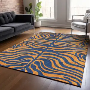 Photo of Navy Blue And Pink Animal Print Washable Indoor Outdoor Area Rug