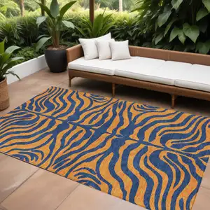 Photo of Navy Blue And Pink Animal Print Washable Indoor Outdoor Area Rug