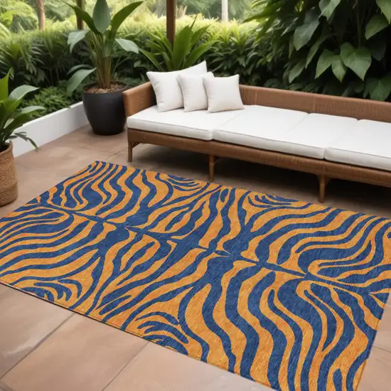 Navy Blue And Pink Animal Print Washable Indoor Outdoor Area Rug Photo 1