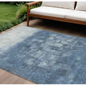 Photo of Navy Blue And Silver Abstract Washable Indoor Outdoor Area Rug