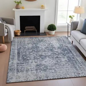 Photo of Navy Blue And Silver Oriental Washable Area Rug With UV Protection
