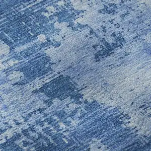 Photo of Navy Blue And Sky Blue Abstract Washable Area Rug With UV Protection