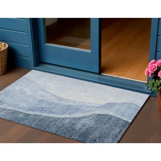 Navy Blue And Sky Blue Abstract Washable Indoor Outdoor Area Rug Photo 1