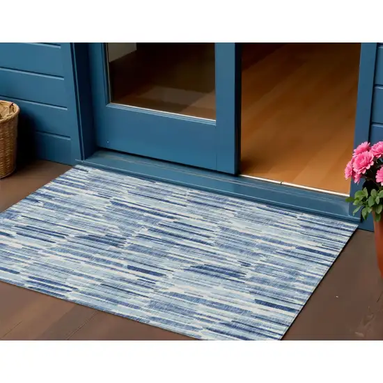 Navy Blue And Sky Blue Abstract Washable Indoor Outdoor Area Rug Photo 1