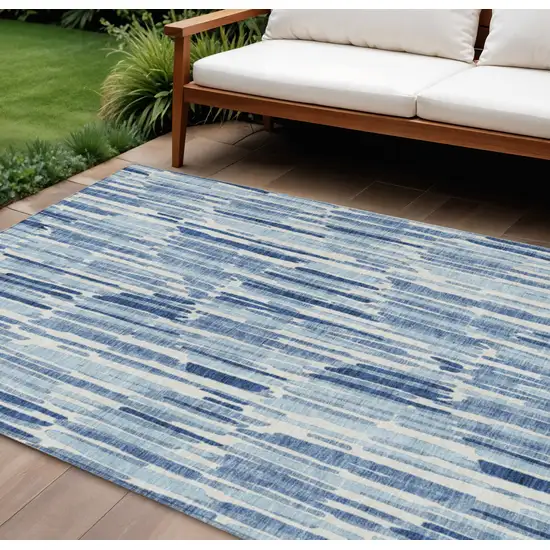 Navy Blue And Sky Blue Abstract Washable Indoor Outdoor Area Rug Photo 1