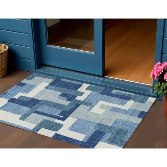 Navy Blue And Sky Blue Abstract Washable Indoor Outdoor Area Rug Photo 1