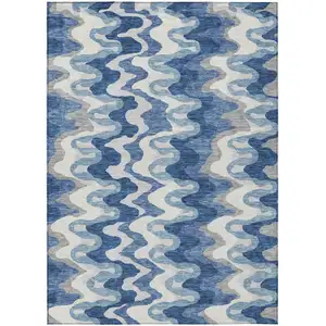 Photo of Navy Blue And Sky Blue Abstract Washable Indoor Outdoor Area Rug