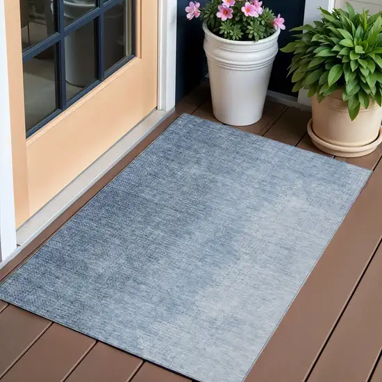 Navy Blue And Sky Blue Abstract Washable Indoor Outdoor Area Rug Photo 1