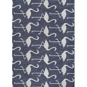 Photo of Navy Blue And White Animal Print Indoor Outdoor Area Rug