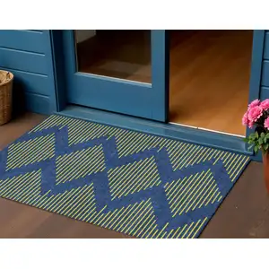 Photo of Navy Blue And Yellow Geometric Washable Indoor Outdoor Area Rug