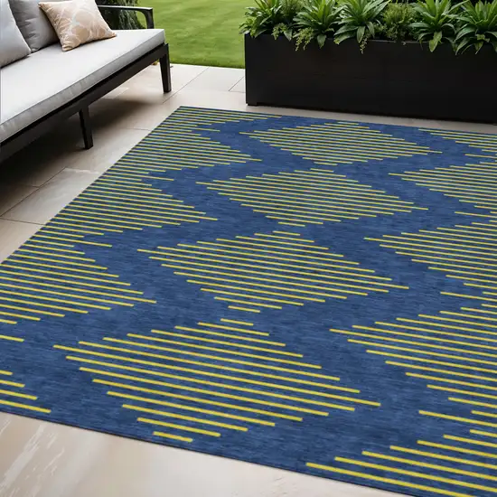 Navy Blue And Yellow Geometric Washable Indoor Outdoor Area Rug Photo 1
