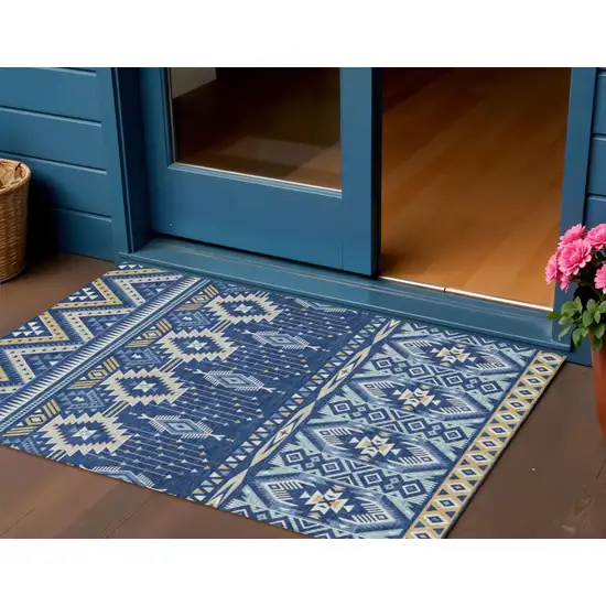 Navy Blue Beige And Ivory Aztec Washable Indoor Outdoor Area Rug Photo 2