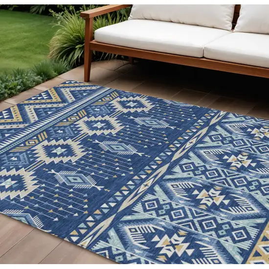 Navy Blue Beige And Ivory Aztec Washable Indoor Outdoor Area Rug Photo 2