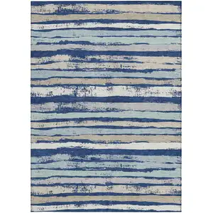 Photo of Navy Blue Beige And Ivory Striped Washable Indoor Outdoor Area Rug
