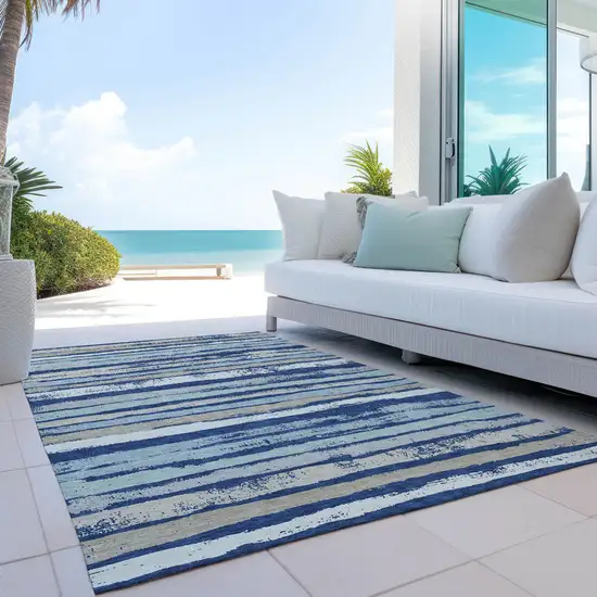 Navy Blue Beige And Ivory Striped Washable Indoor Outdoor Area Rug Photo 9
