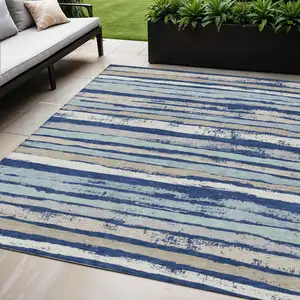 Photo of Navy Blue Beige And Ivory Striped Washable Indoor Outdoor Area Rug