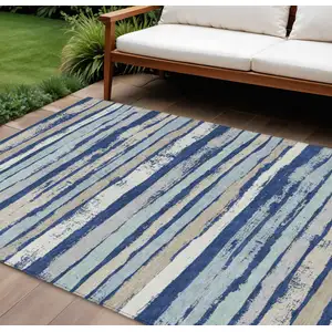 Photo of Navy Blue Beige And Ivory Striped Washable Indoor Outdoor Area Rug