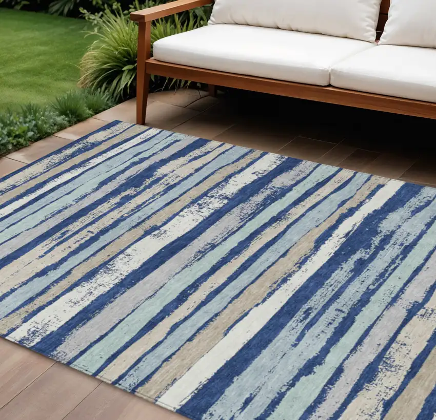 Navy Blue Beige And Ivory Striped Washable Indoor Outdoor Area Rug Photo 1