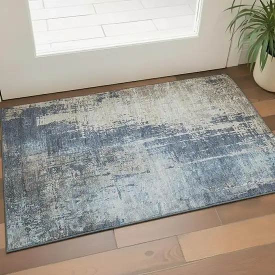 Navy Blue Beige And Taupe Abstract Washable Area Rug With UV Protection Photo 1