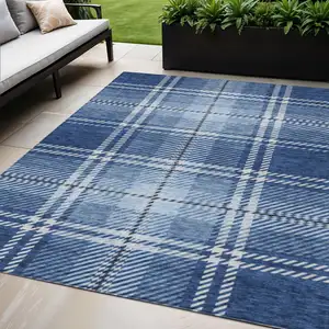 Photo of Navy Blue Black And Ivory Plaid Washable Indoor Outdoor Area Rug