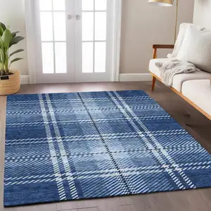 Photo of Navy Blue Black And Ivory Plaid Washable Indoor Outdoor Area Rug