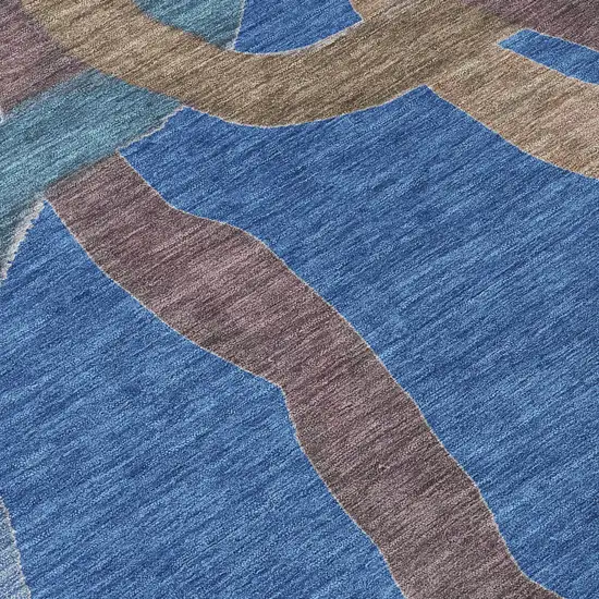 Navy Blue Brown And Mauve Abstract Washable Indoor Outdoor Area Rug Photo 1