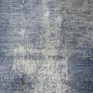 Photo of Navy Blue Charcoal And Ivory Abstract Washable Area Rug With UV Protection